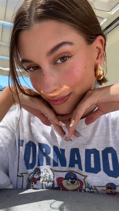 hailey bieber gold hoop earrings.